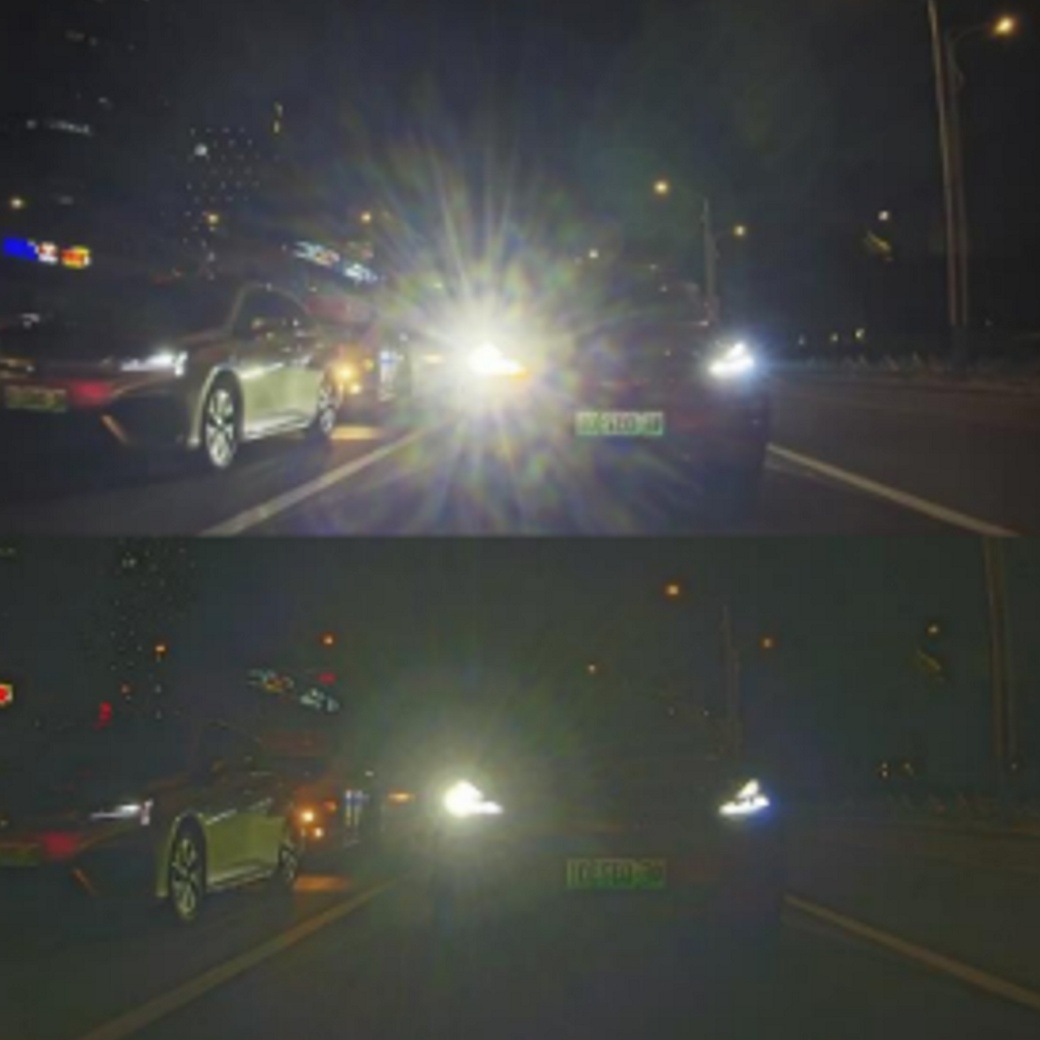 A traffic situation at night as viewed from the rear windo of a car. In the upper part, all details including a car with bright headlights can be seen easily. In the lower part, the same situation is depicted much darker, with the details disappearing and only the bright headlights visible.